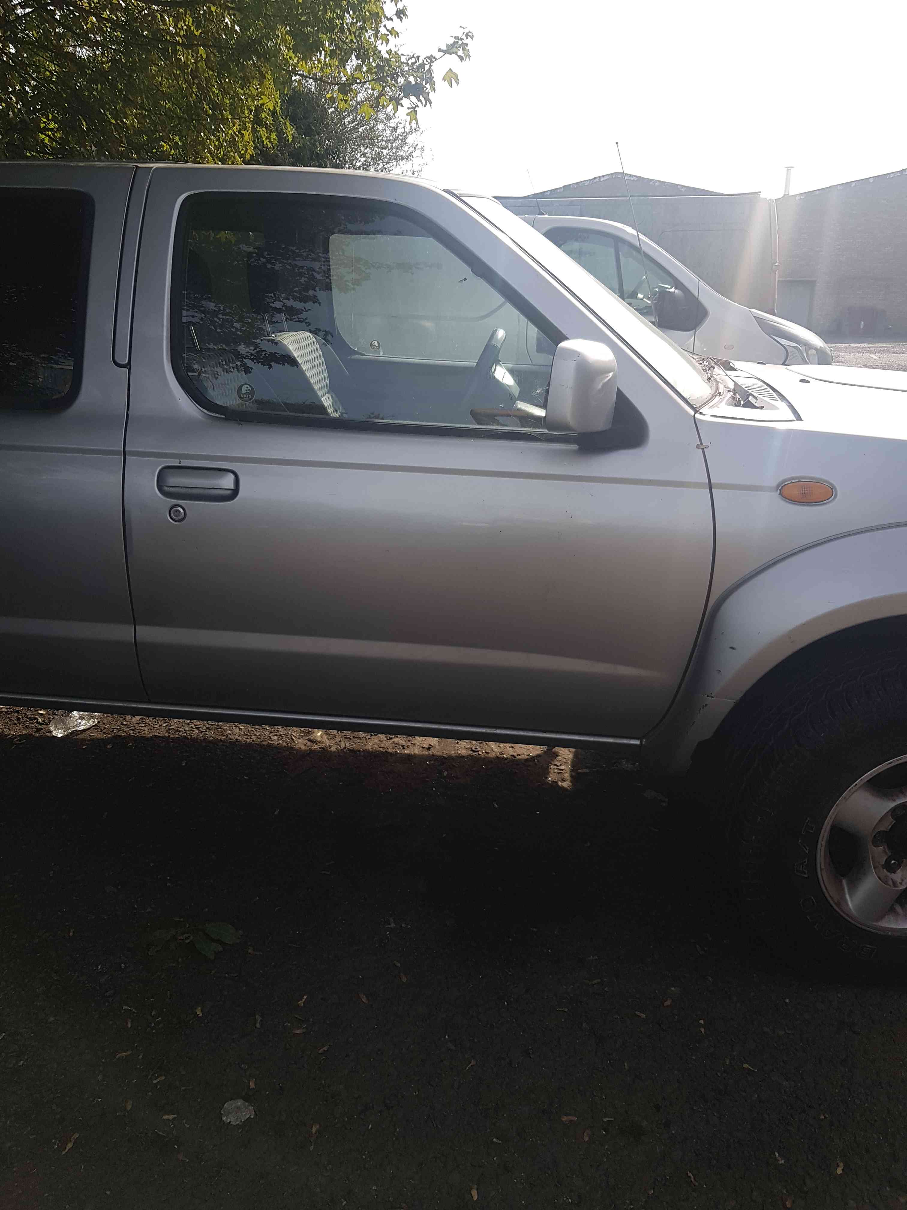 Thumb 2 Nissan Navara D22 2002-2005 KY0 Blade Silver Door OSF Front Door Some Damage
