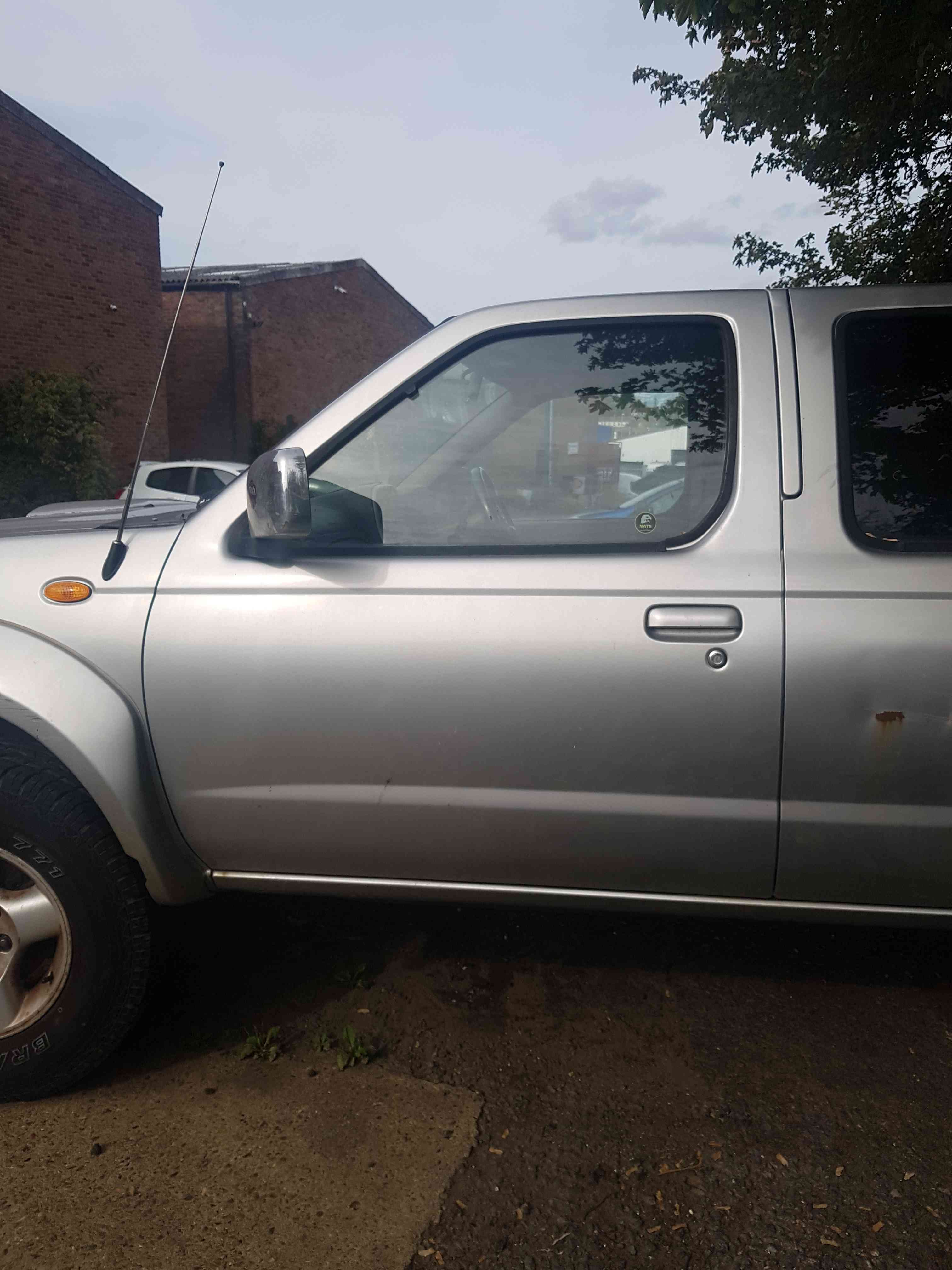 Thumb 4 Nissan Navara D22 2002-2005 Passenger NSF Front Door Blade Silver
