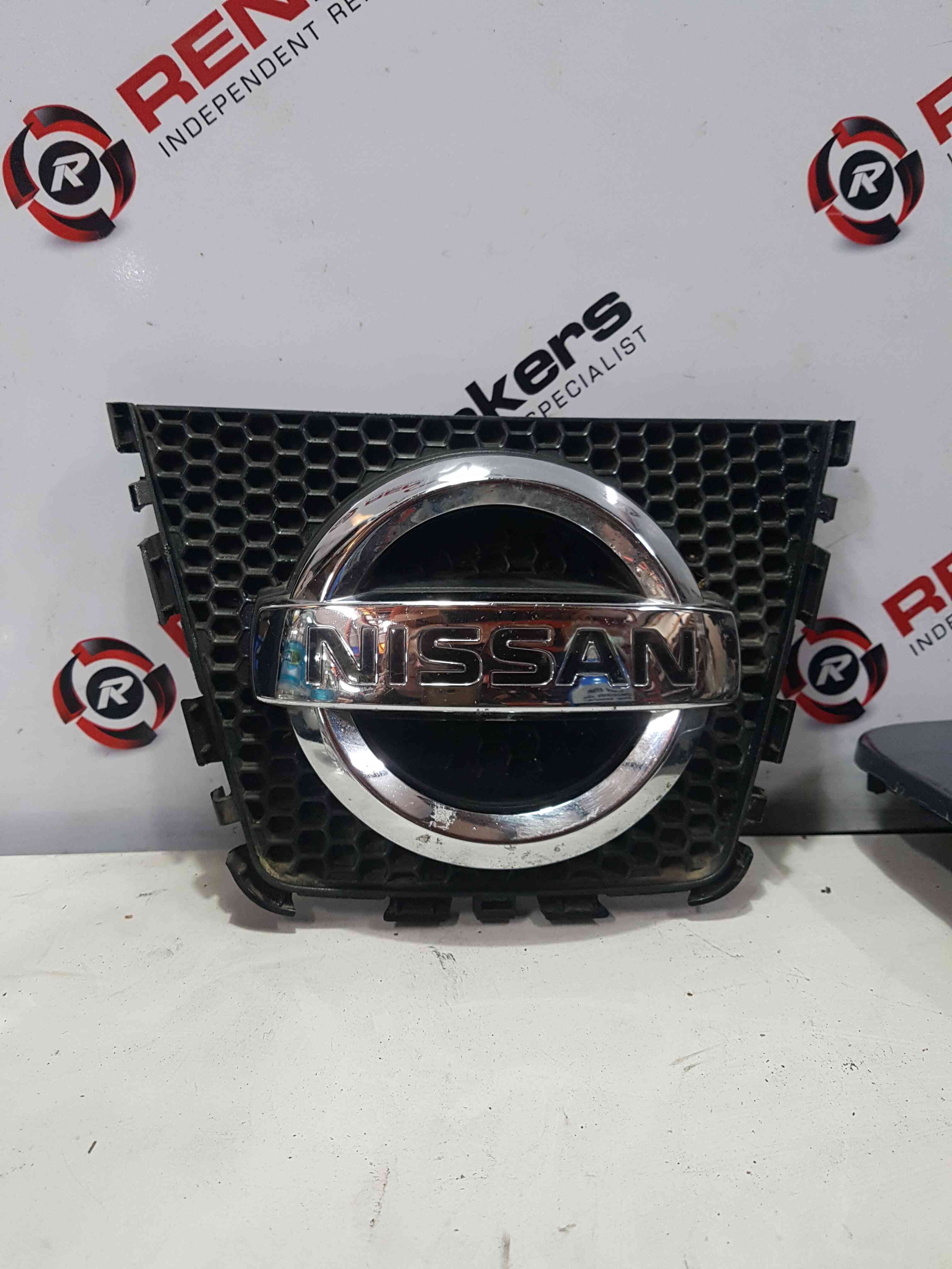 Thumb 2 Nissan Qashqai MK1 2006-2013 Front Bumper Emblem Badge 62314JD00A