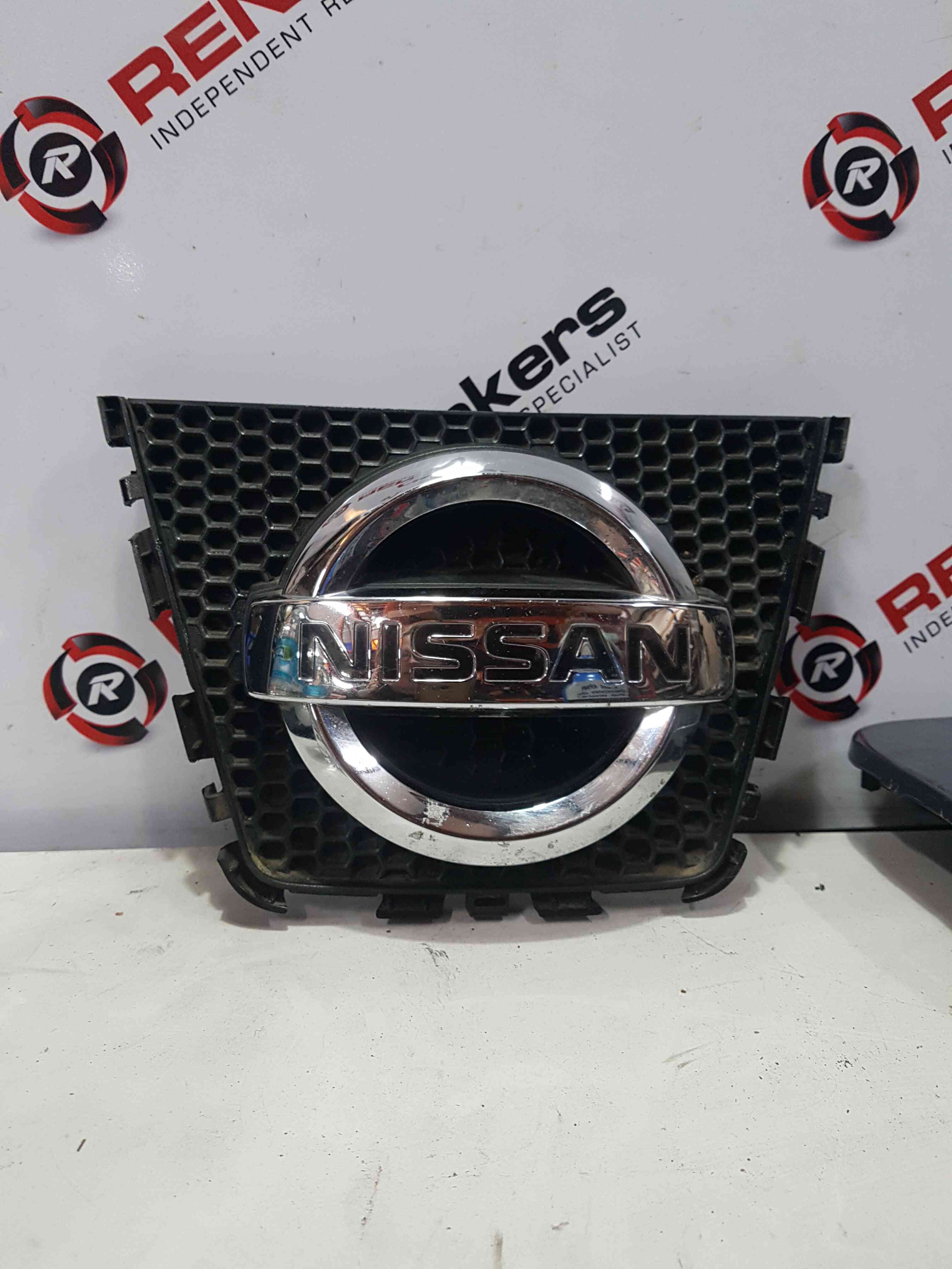 Thumb 4 Nissan Qashqai MK1 2006-2013 Front Bumper Emblem Badge 62314JD00A