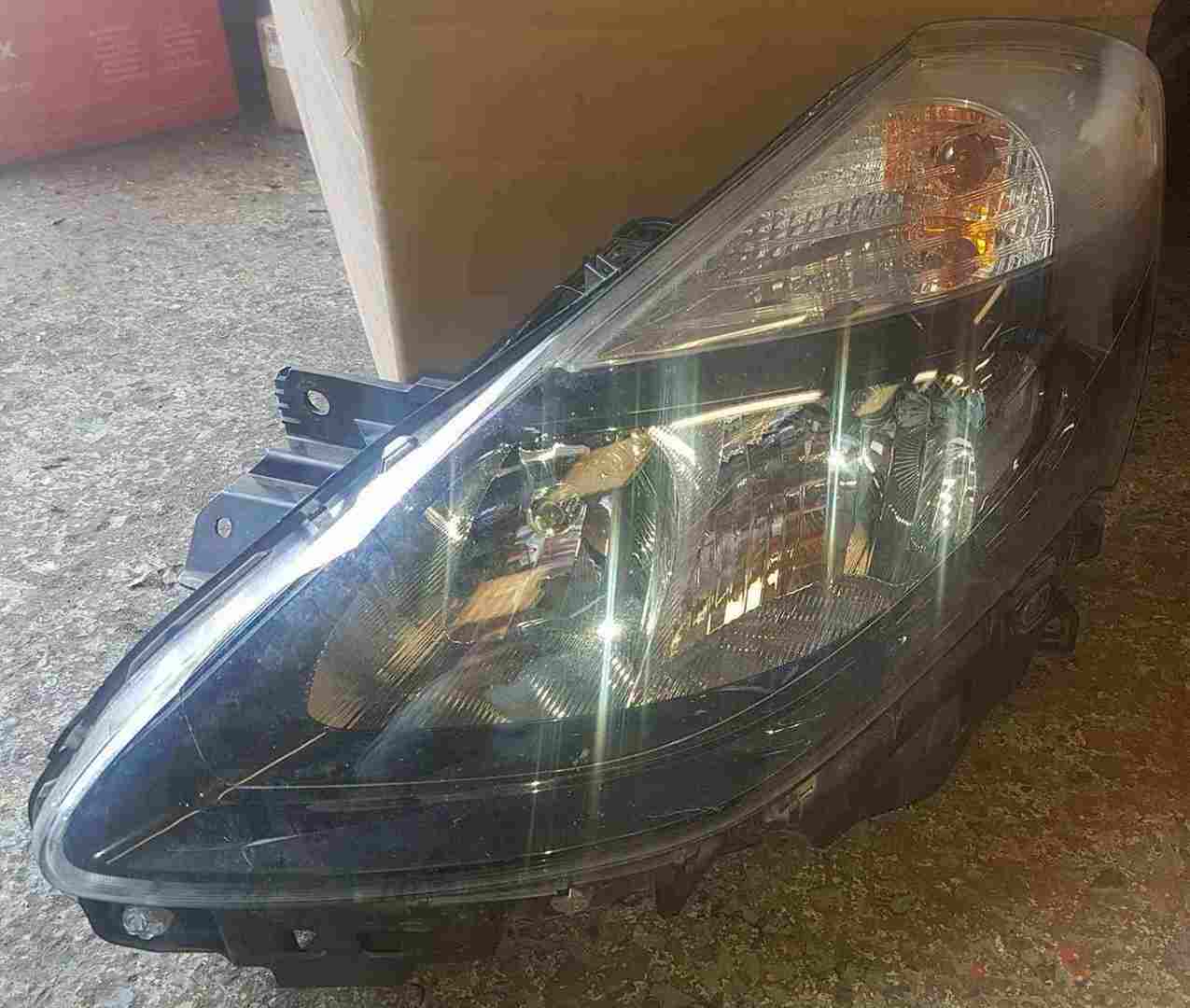 Renault Clio MK3 2009-2012 Passenger NSF Front Headlight Black Backing Cloudy